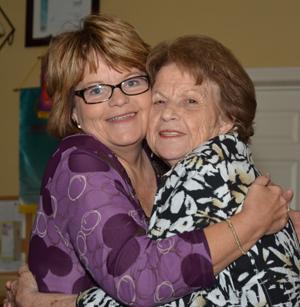 Paula Smith, right, director of alumni relations  at Campbellsville University, gives Alma Canada a hug at the “Campaign for the Commonwealth”  event in Stanford, Ky. (Campbellsville University Photo by Joan C. McKinney)